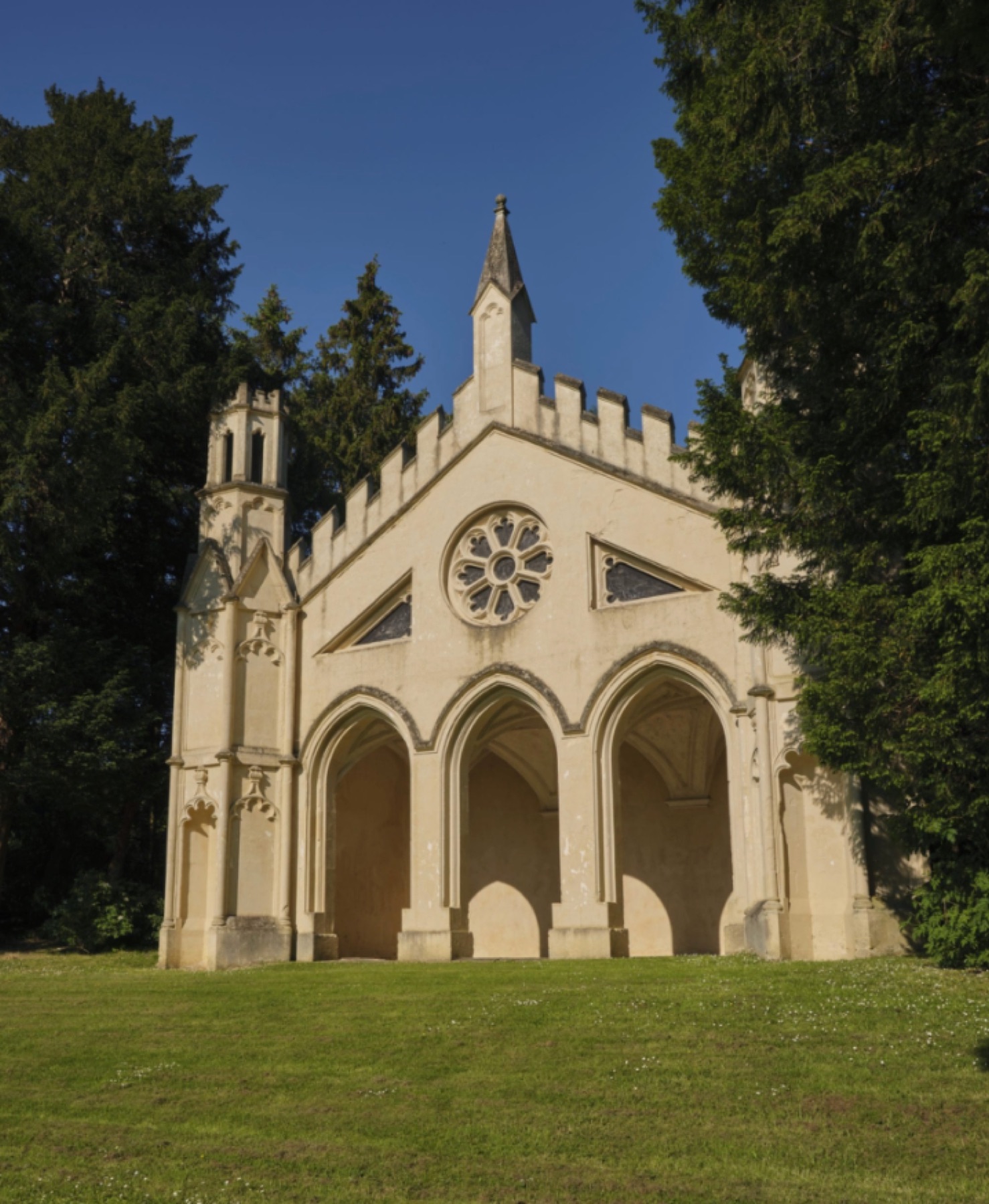 Gothic abbey exterior surrounded by trees