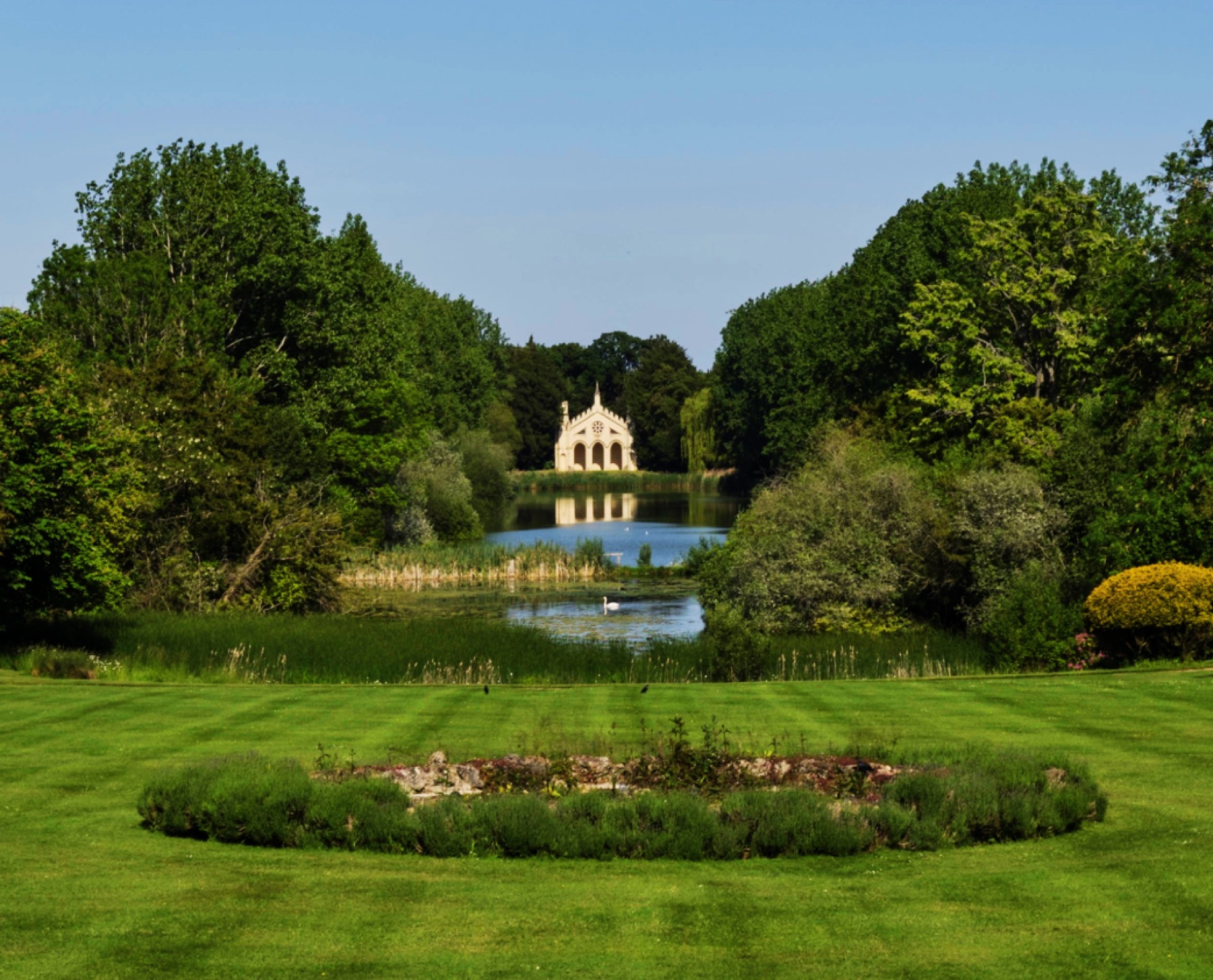 Formal garden with a lake and pavilion
