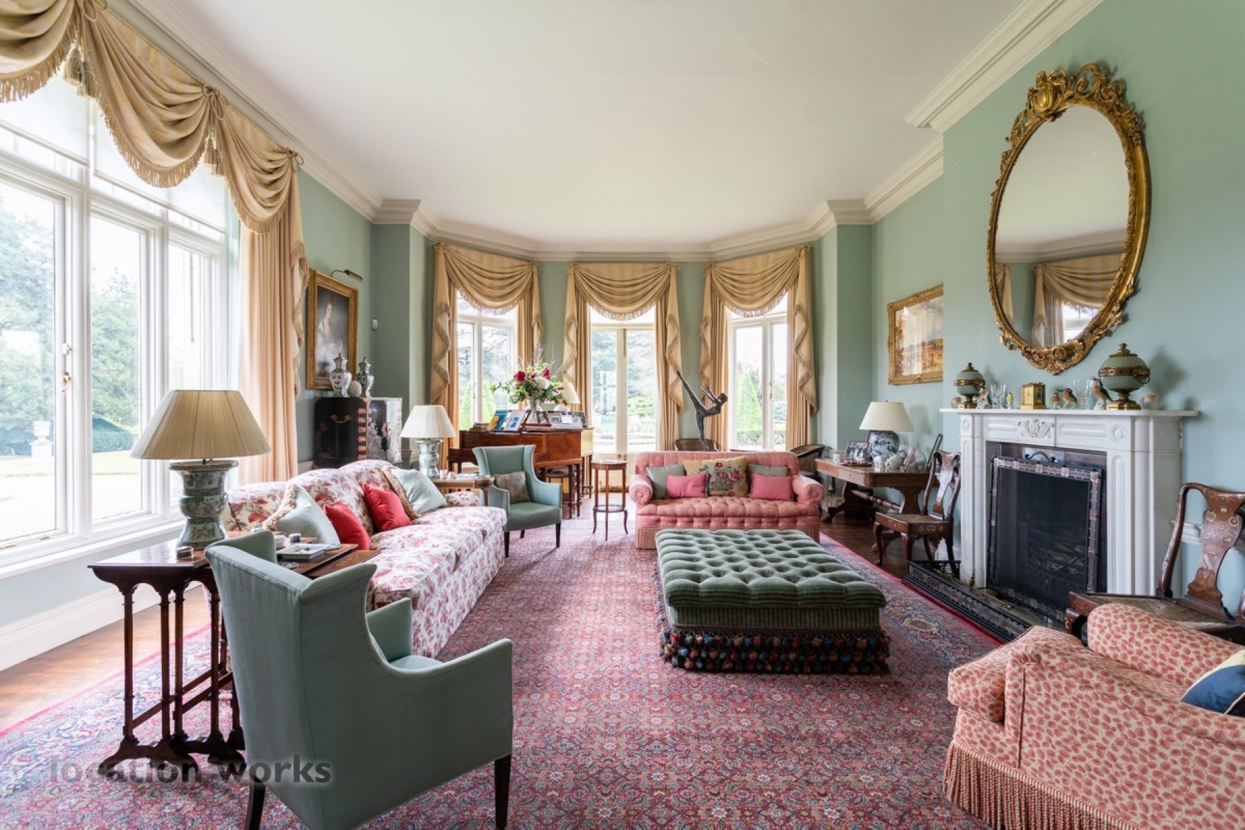 Pastel drawing room with bay windows